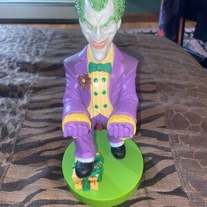 Joker video game controller / cell phone holder